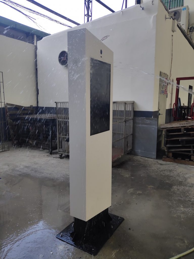 Water-spray test of a 32-inch floor-standing outdoor advertising display