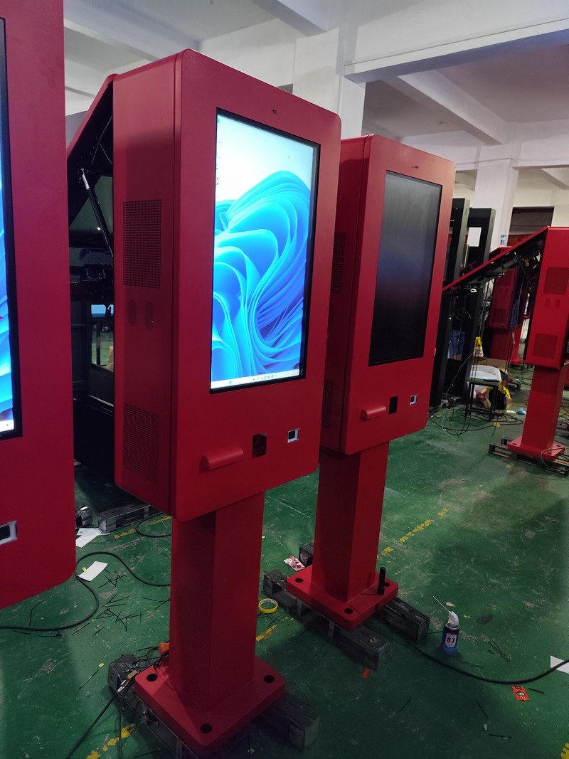 Two LCD screens being tested for an outdoor ordering display